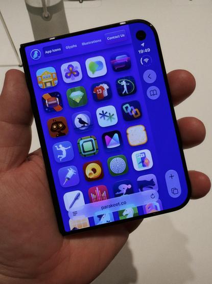 iPhone Duo in its closed state, showing the Parakeet website