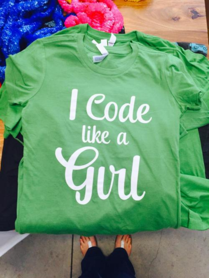 T-shirt with the slogan "I code like a girl" using a beautiful calligraphic typography