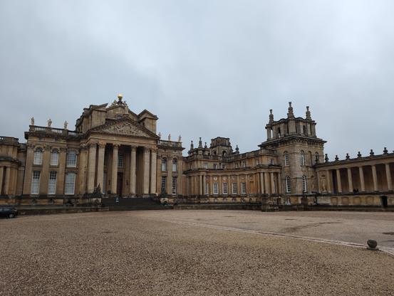 The view from the courtyard of Blenheim Palace with its very odd but delightful towers, classical envy, and giant Britannia statue.