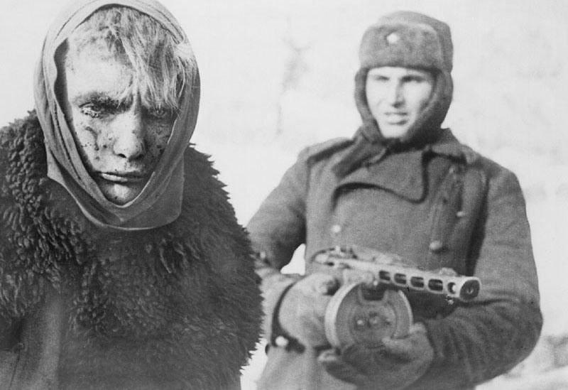 Soviet soldier with a German prisoner