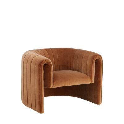 a soft and furry-looking armchair; it is brown
