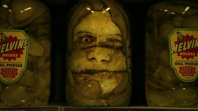 The pickle jar in the groceries shop.