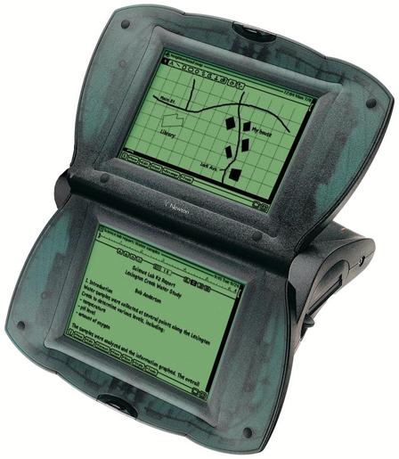 An Apple eMate Duo with a open butterfly dual green LCD screen design. The body is made from textured aqua marine colored plastic, and the screens are displaying a neighborhood map on the top screen and a science lab report. on the bottom screen The device is labeled "Newton" and shows text and graphical elements typical of early personal digital assistants.
