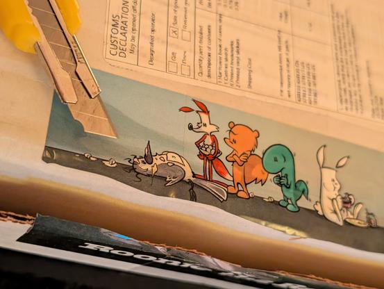 A box with the first edition of Cute Animals