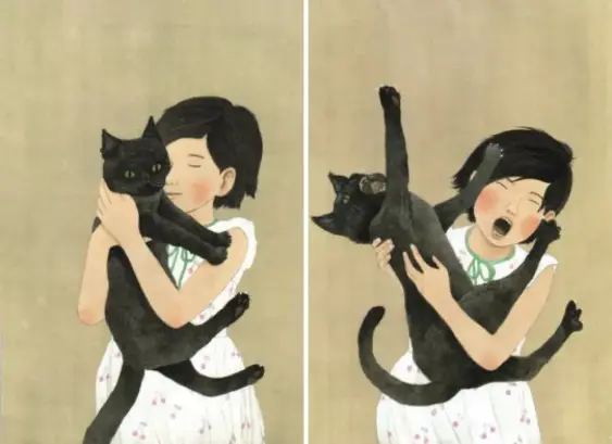 The left pane has a cat in a calm, affectionate cuddle, where the cat sits peacefully against the girl.

The right pane has a thrashing, uncooperative cat doing gymnastics to break free.