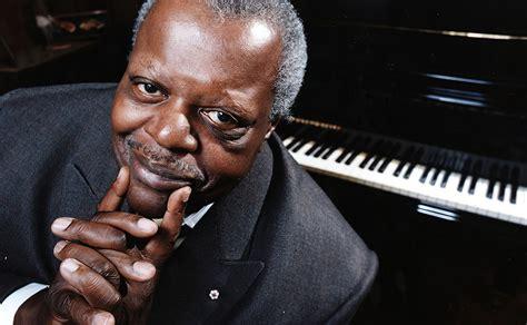 Image of Oscar Peterson. He has dark skin