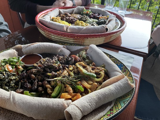 Two large bowls of Ethiopian food 