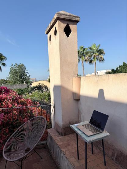 The same balcony but my laptop is visible 