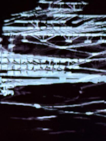 Screen with illegible graphs