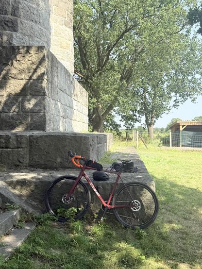 The bike in front of an old German tower 