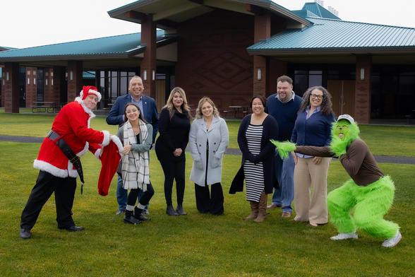 Heritage Social Work Faculty with Santa and the grinch. 