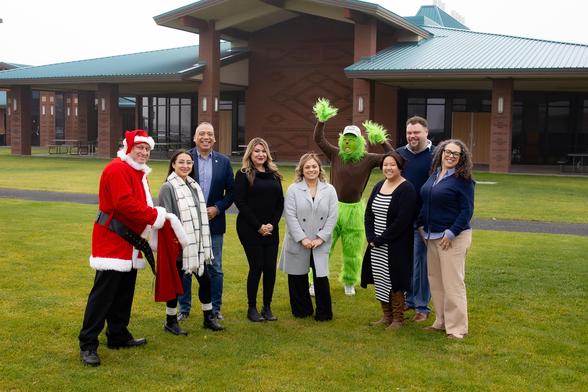 Heritage Social Work Faculty with Santa and the grinch. 