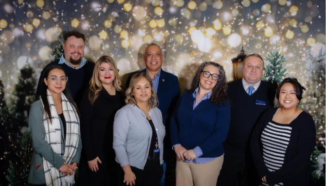 Social work faculty from Heritage for holiday photo. 