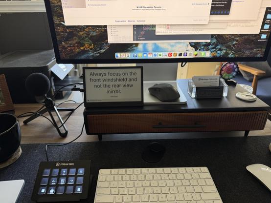 Photo of my computer set up with a stream deck, and a little bit of the computer screen showing