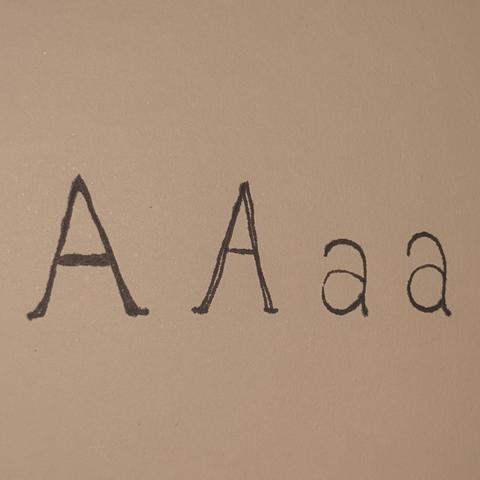 A drawing of two capital letter A's and two lowercase a's 