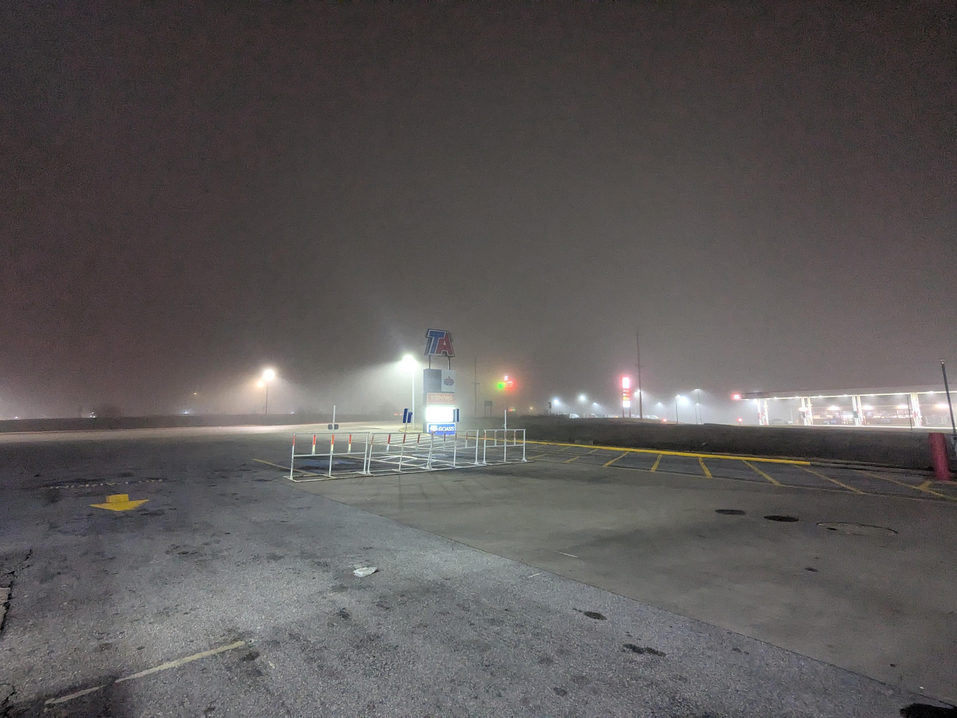 A foggy gas station
