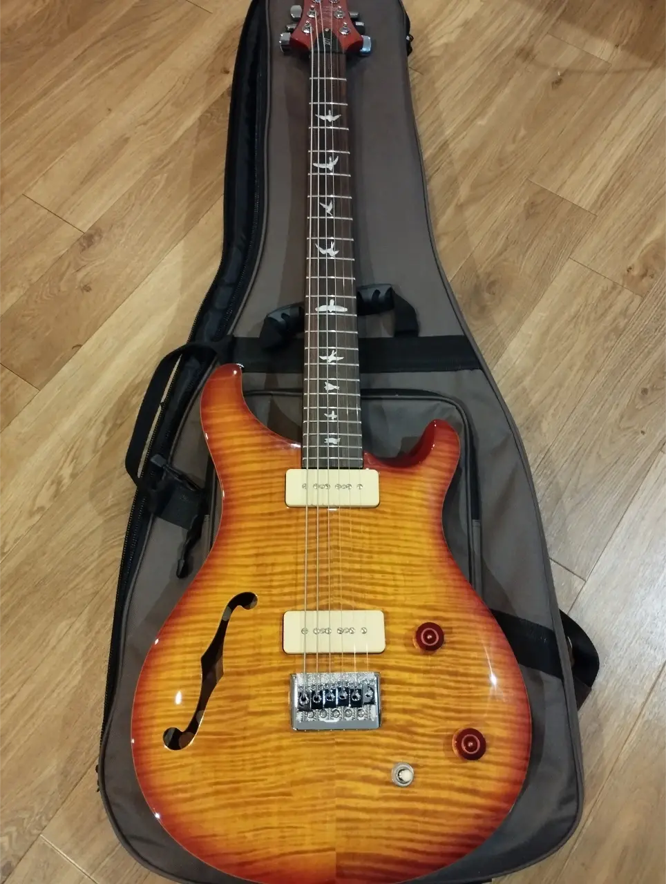 A PRS SE 277 semi-acoustic baritone guitar
