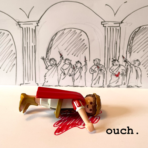 Photo of  assassinated Julius Caesar, playmobil version, with a hand-drawn backdrop of conspirators