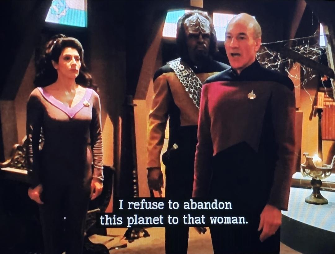 Picard says to Trip and Worf: I refuse to abandon this planet to THAT WOMAN.