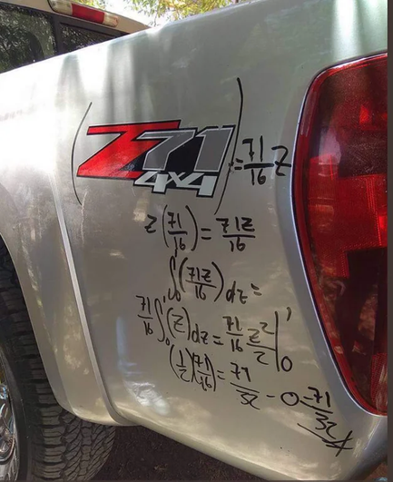 "Z 71 4x4" on a pickup truck panel is annotated with black marker pen to show

= (71/16)*z = z * (71/16) = 71z/16 = integral from 0 to 1 of (71Z/16)dz = 71/16 * integral from 0 to 1 of (z)dz = (71/16) * (z^2/Z) evaluated from 0 to 1 = (1/2)(71/16) = 71/32