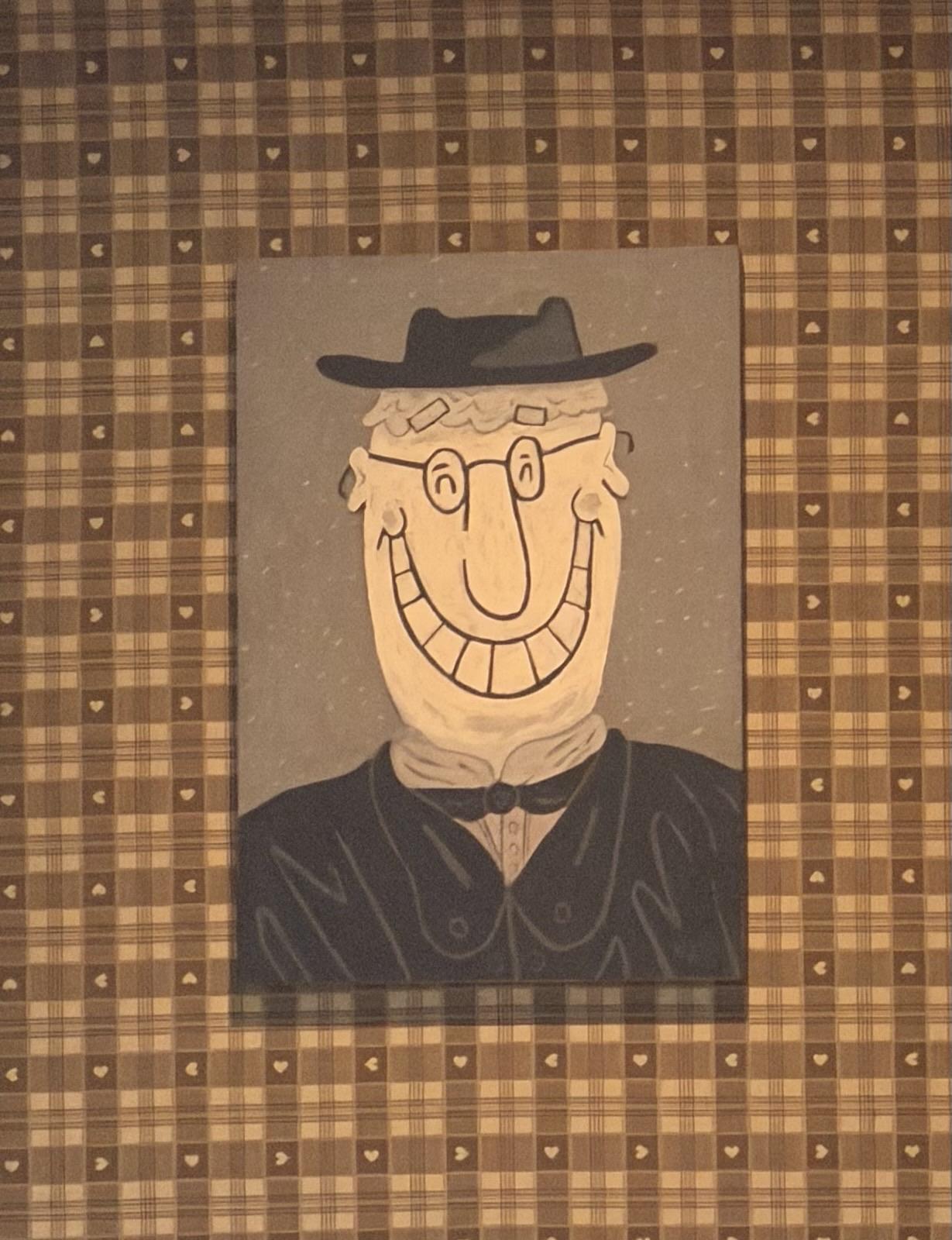 A caricature of an evil grinning man.