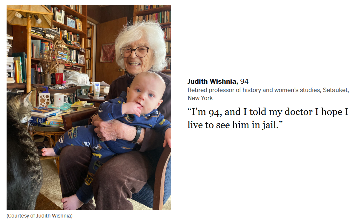 Picture of an elderly lady in glasses holding a baby. Both are looking into the camera. The text next to the photo reads: "Judith Wishnia, 94, Retired professor of history and women’s studies, Setauket, New York.  “I’m 94, and I told my doctor I hope I live to see him in jail.”