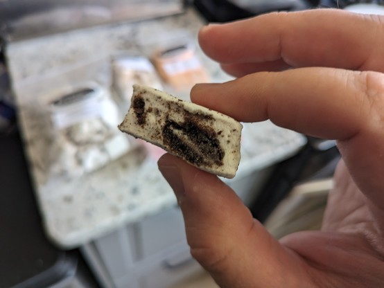 A piece of cookies and cream marshmallow