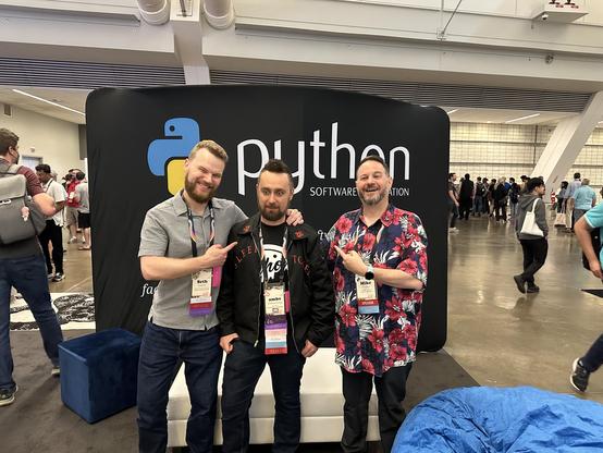 A picture of the PSF Developers in Residence at the PAF Booth. 