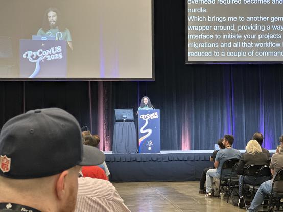 A photo of Mario delivering his lightning talk on the main stage at PyCon US 25