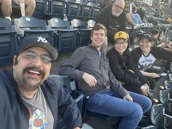 The five of us in our seats. Adam is in the top row. From left to right in the lower row:
Me, David, Elaine, and Jean
