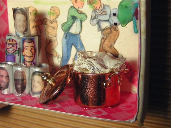 A different perspective showing the copper pot with the boiling bone which looks like a skull.