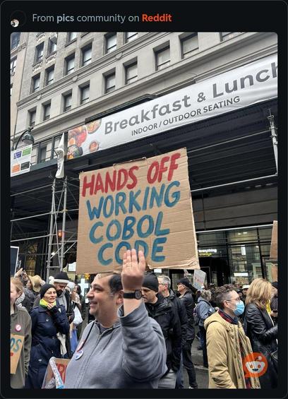 Protest poster states: Hands off working cobol code
