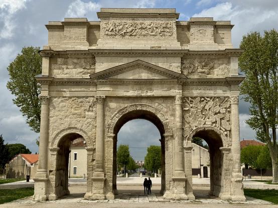 Three arches supporting friezes