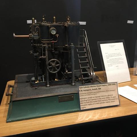 Twin Cylinder Marine Steam Engine, 1944-1950,
K.W. Holmgren, Duluth, MN

Holmgren served as engineer aboard a steamer operating from Sweden in the early 1900s; 25 years later he built this model from memory. The model is a complete replica of a twin cylinder marine steam engine.

From the museum exhibit