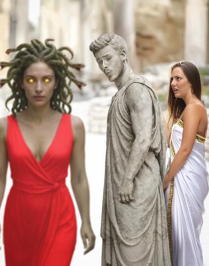 An image of three people.
One person is a woman wearing a red dress, with glowing eyes and snakes for hair (slightly out of focus).
The second person is a man looking at the women in the red dress, but has been turned into a statue.
The third person is a woman wearing a white toga, giving the man an angry look.