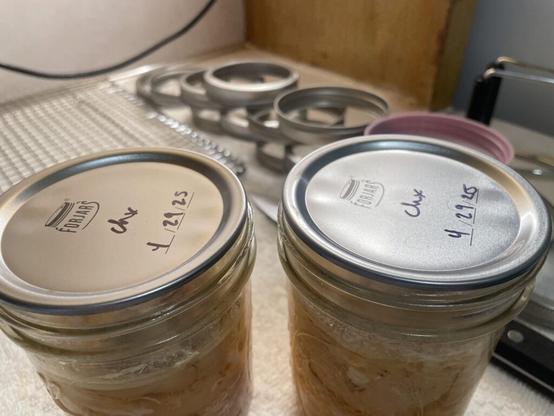 Questions about tiny dents in lids (definitely not buckled)