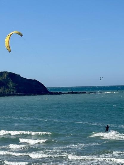 View of a kite surfer on Nefyn beach.