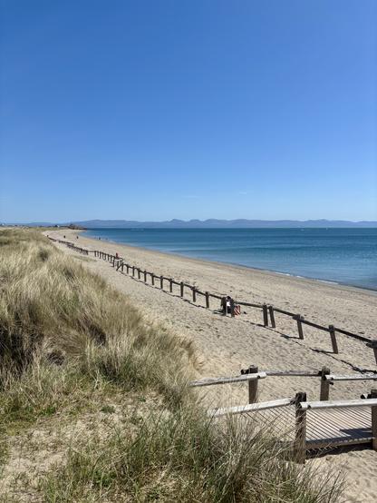 Views south from Pwllhelli beach over Yr Eyri. Yr Wyddfa is not in shot.