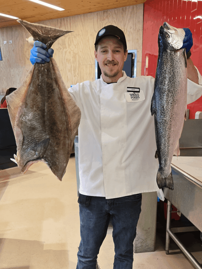 Whole halibut and Atlantic salmon for cutting into steaks.
