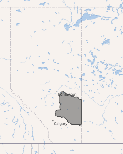 A beige map centered on the province of Alberta in mostly beige with blue areas of river and lakes shows a grey shaded area on the east/right side of the province spanning the area between Edmonton and Calgary to the Saskatchewan border.