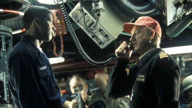 Denzel and Gene staring each other down.