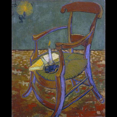 The image depicts a painting by Vincent Van Gogh. It features a wooden chair with a cushion, set against a backdrop of a yellow wall and a green floor adorned with a patterned carpet. On the seat of the chair, there is a small stove, upon which sits a lit candle and a teacup. The painting is characterized by its use of bright colors and distinctive artistic style, with visible brushstrokes that contribute to its expressionist nature.