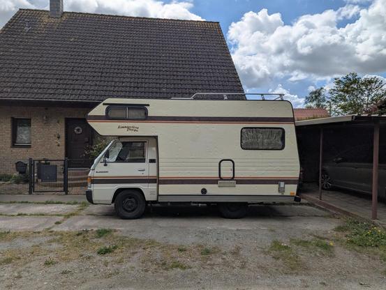 a kei truck with a camper