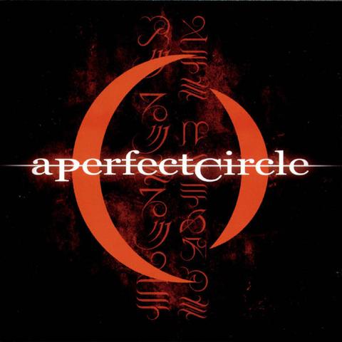 A cover art consists of a dark slightly textured background in dark reds and browns, with some symbols printed vertically in the center in a light red, with the band name in white font and logo (2 separate halves of a circle of different sizes, arcs facing outward so it's a broken circle) in orange printed on top. The The symbols (not sure what language) apparently can be translated to "La Cascade des Prénoms", or in English means "the waterfall of first names".