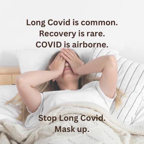 A woman lies in bed with her hands covering her face, appearing distressed. Text on the image:  “Long Covid is common.  Recovery is rare.  Covid is airborne.  Stop Long Covid.  Mask up!”