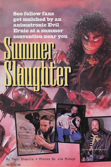 the 1st page of an article, it is a costumed man in an animatronic mask, on a motorcycle, the headline reads 'see fellow fans get mulched by an animatronic evil enie at a summer convention near you' and in yellow larger letters under 'summer slaughter'