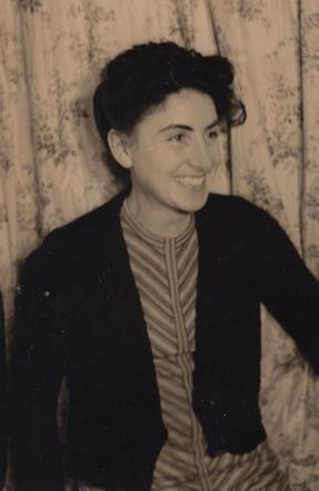 A photo of a young smiling woman.