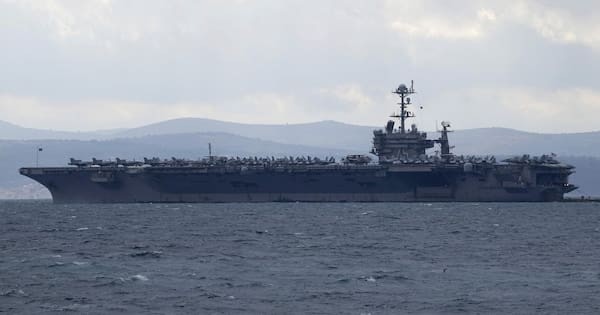 US fighter jet landing on aircraft carrier goes overboard