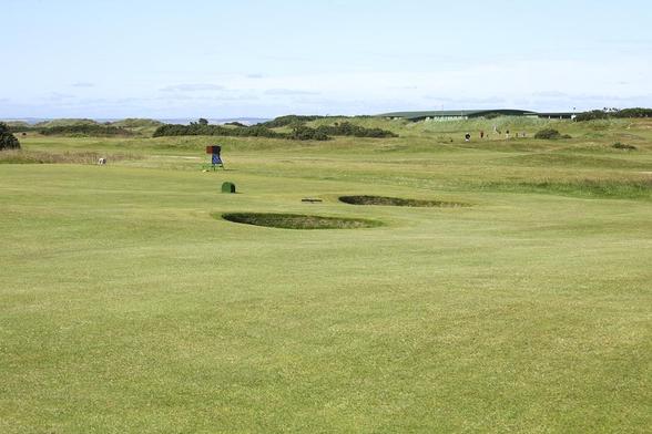 Deep holes at the old golf course in St. Andrews,  Scotland