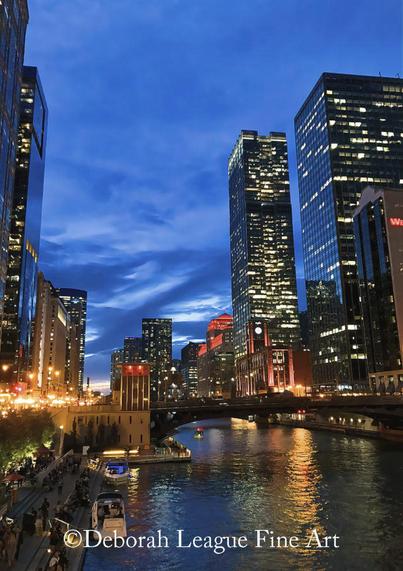 Chicago Riverwalk At Night.

Urban explorers love the Chicago Riverwalk, a 1.25-mile stretch located on the south bank of the Chicago River, right in the heart of downtown Chicago. This multi-award-winning, pedestrian-friendly attraction is populated with intimate coves; waterfront cafes, wineries, and bars; history-making public art; monuments; museums; and amazing excursions on the water. It’s also a great place to take in Chicago’s stunning architecture.